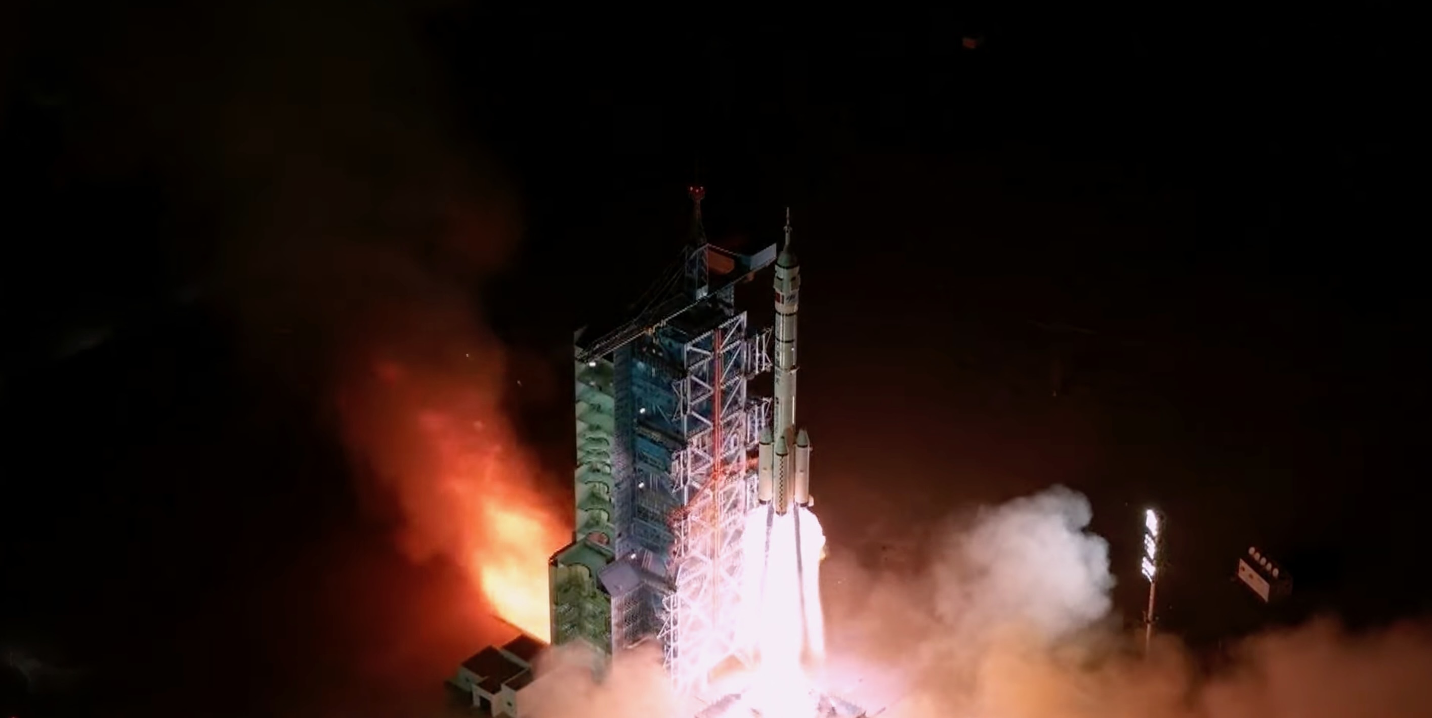 Screenshots showing a rocket blasting off from a launch pad